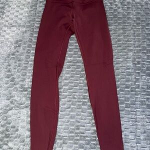 Women’s Lululemon cranberry color leggings